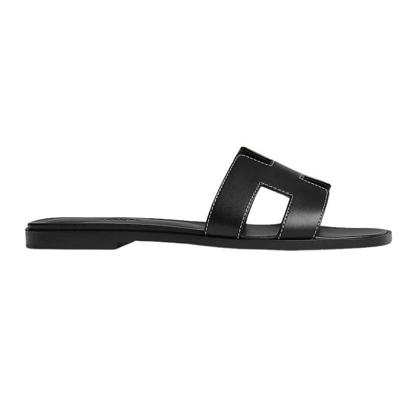 WhatsApp Image 2025-08-22 at 1.32.40 PM (1) Hermes Oran Sandal Black Calfskin – White Top Stitch Flat - Image 1